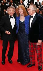 Formula 1 -ajaja Sir Jackie Stewart, vaimonsa Helen Stewart ja ohjaaja Roman Polanski,  The 66th Annual Cannes Film Festival. Weekend Of A Champion -ensi-ilta