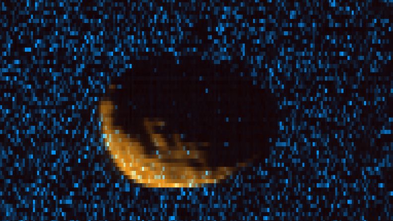 Phobos as observed by MAVEN's Imaging Ultraviolet Spectrograph. Orange shows mid-ultraviolet (MUV) sunlight reflected from the surface of Phobos, exposing the moon's irregular shape and many craters. Blue shows far ultraviolet light detected at 121.6 nm, which is scattered off of hydrogen gas in the extended upper atmosphere of Mars. Phobos, observed here at a range of 300km, blocks this light, eclipsing the ultraviolet sky.
